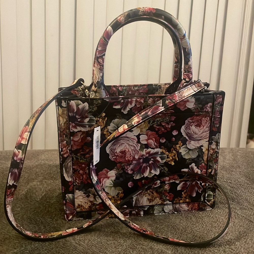Brand new Express floral and black small purse with detachable cross strap